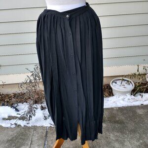 Skirt: silk, black, pleated, button-up front. No size or id tags
